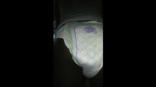 Black girl pooping Luvs Diaper No. 2