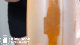 A bottle of pis and a jar of shit, ready to deliver