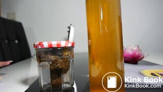 A bottle of pis and a jar of shit, ready to deliver