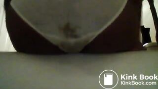 Girl poops and pees her white panties - video 2