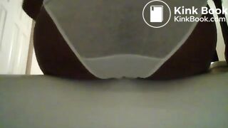 Girl poops and pees her white panties - video 2