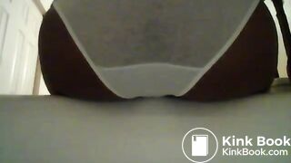 Girl poops and pees her white panties - video 2