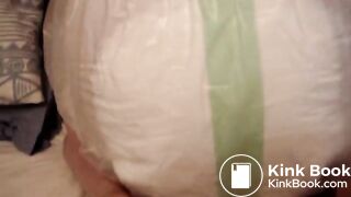 Mature woman pooping and peeing in her large diaper