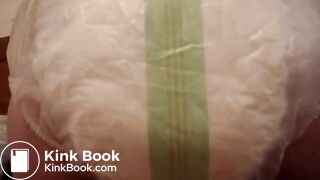 Mature woman pooping and peeing in her large diaper