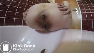 Bubble butt girl shitting in bathtub