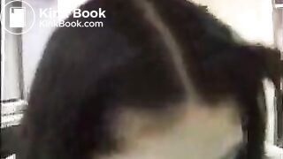 Asian woman poops her skirt.