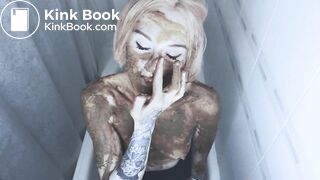 Girl shits and plays with it