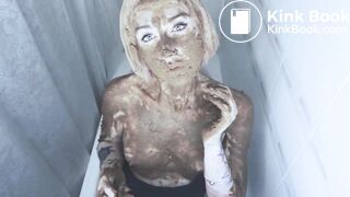 Girl shits and plays with it