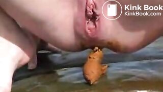 ginger eats her scat on the beach