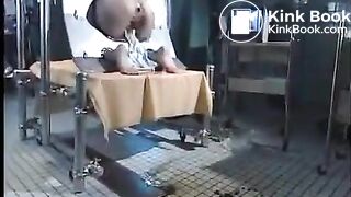 Love the positioning device, the hot girl sure needed that enema