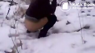 Girl poops on the snow