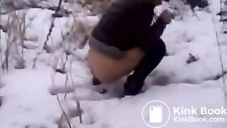 Girl poops on the snow