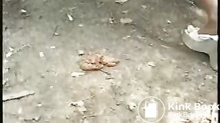 Nice short haired brunette shitting in the woods