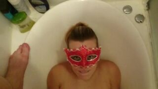 Sucking cock while being smeared in shit