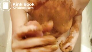 Sucking cock while being smeared in shit