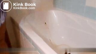 Blonde shitting and pissing inside the bathtub