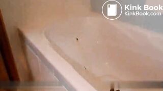 Blonde shitting and pissing inside the bathtub
