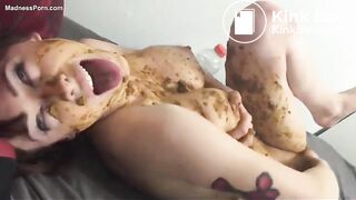 Attractive woman with fake tits rubs in scat