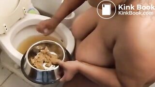 Ebony slave digging in toilet