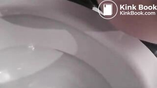 Milf shitting over toilet