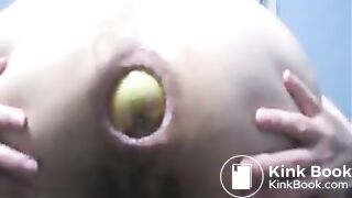 Wife gets her asshole painfully stretched with apples.