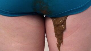 Soft poop in blue panties.