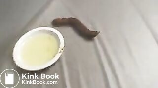 Naked Jap babe manage to poop a long turd in library