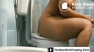 Ebony has diarrhea on the toilet