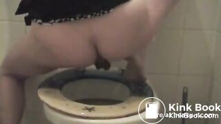 Sexy girl shits in toilet