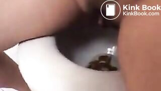 Hot Brazilian girl on toilet