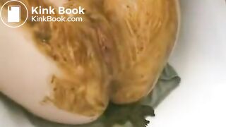 Girl smears fresh shit on her sexy body