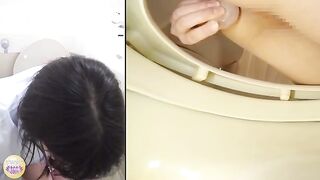 Japanese office worker girl expels in a western style toilet