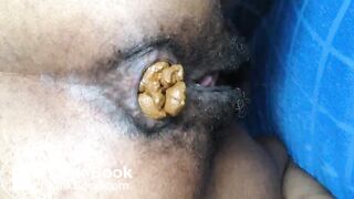 Hairy Ebony Pushes out a Fat Turd (HD)