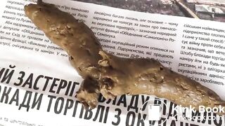 Scat on a newspaper