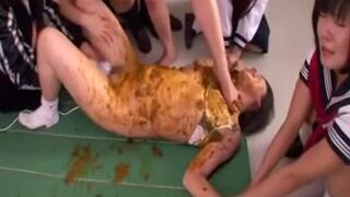 Schoolgirls cover their shy friend in shit