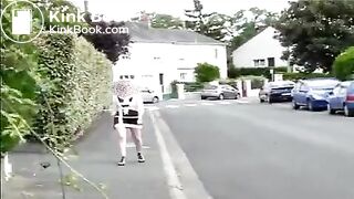 Mature woman shitting on the street