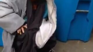 Crackhead lady takes a hot, wet shit on sidewalk