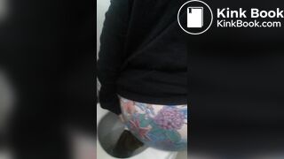 Tatoed woman take a big dump