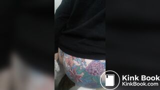 Tatoed woman take a big dump