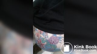 Tatoed woman take a big dump