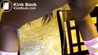 Slim black girl takes a shit and pee standing