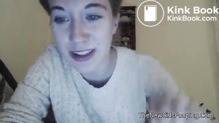 Cute teen girl sits on the toilet in front of the camera. She starts poopin