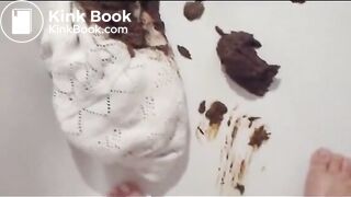 woman does a pretty large shit in white tights