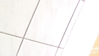 Slim amateur shitting into a plastic container