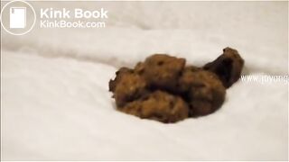 Sexy blonde pooping on the bed