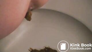 Women shitting on toilet