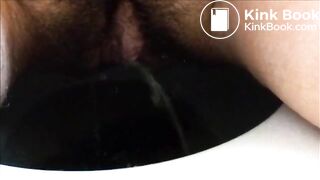 She is shitting and cumming