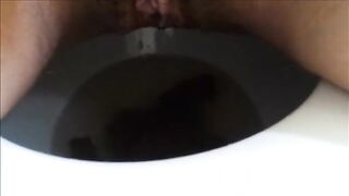 She is shitting and cumming