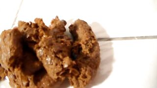 Skinny babe takes a poop on her bathroom floor