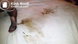 Wife sprays her messy enema onto our bed